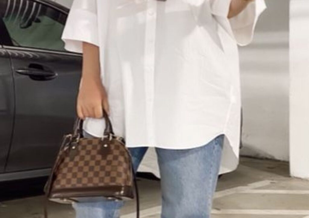 straight-leg jeans with long button-up shirt