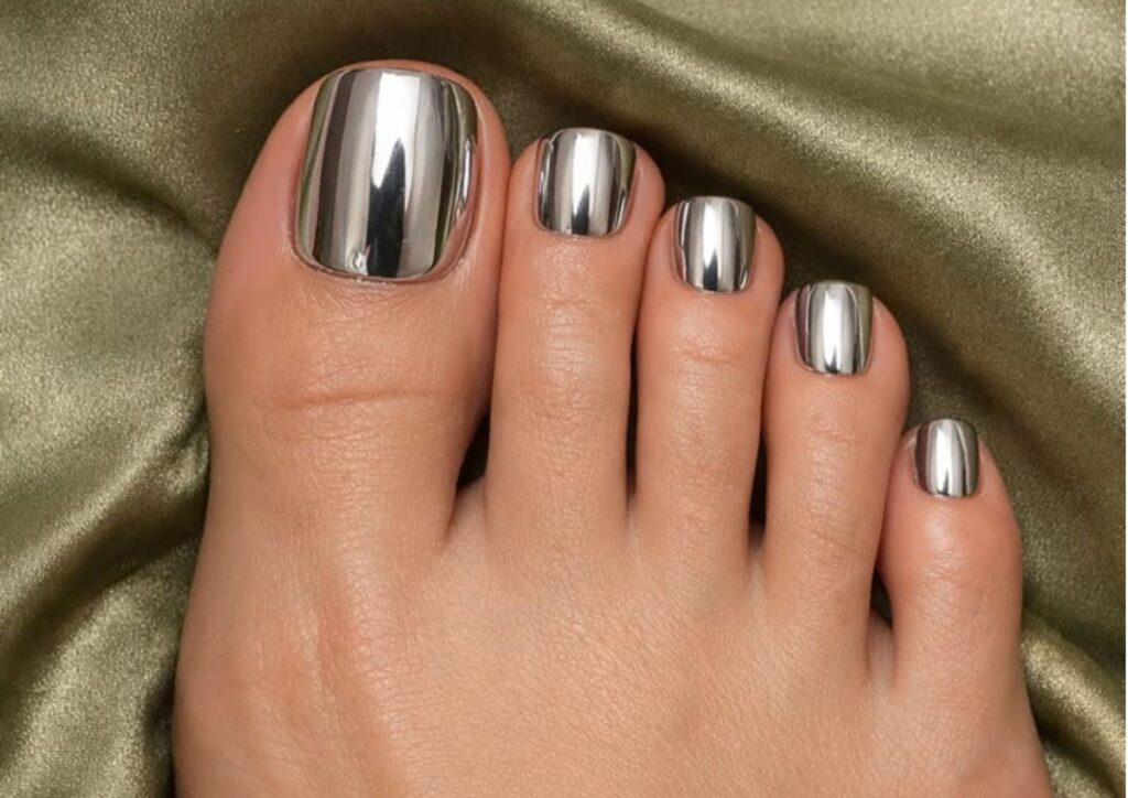 Modern wedding toenail ideas with a reflective chrome finish