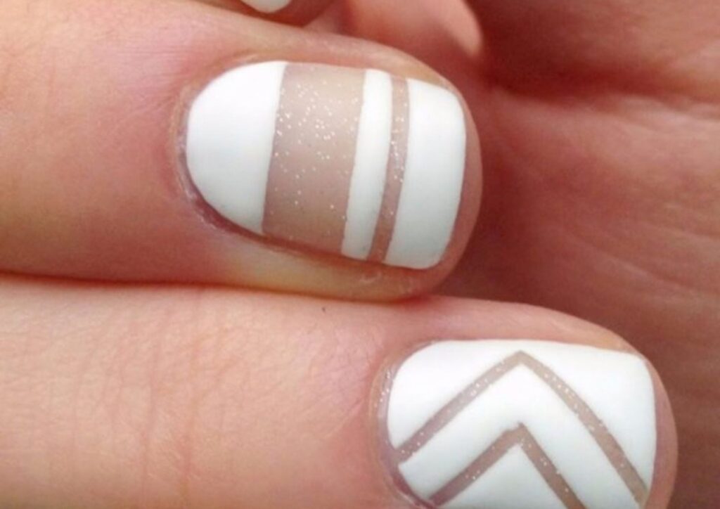 Negative-space short wedding nail design with minimalist details